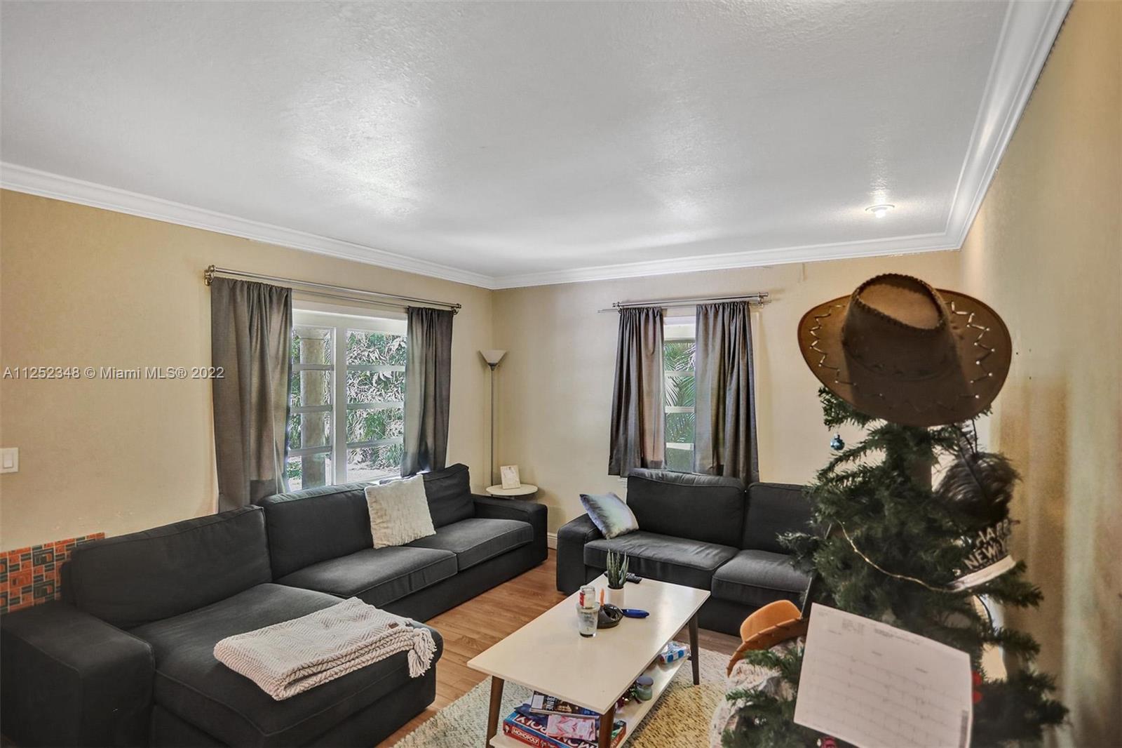 5930 Southwest 47th Street Miami, FL 33155 - Photo 31 of 43 a living room with furniture and a window