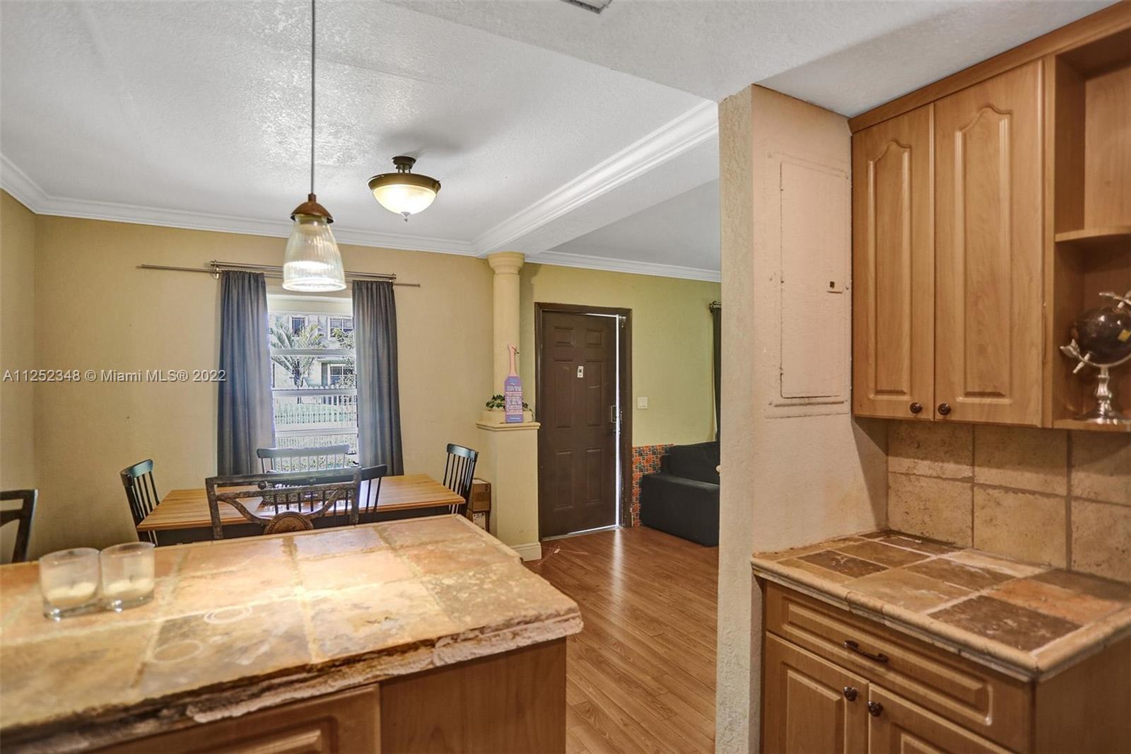 5930 Southwest 47th Street Miami, FL 33155 - Photo 33 of 43 a bathroom with a granite countertop sink and a mirror