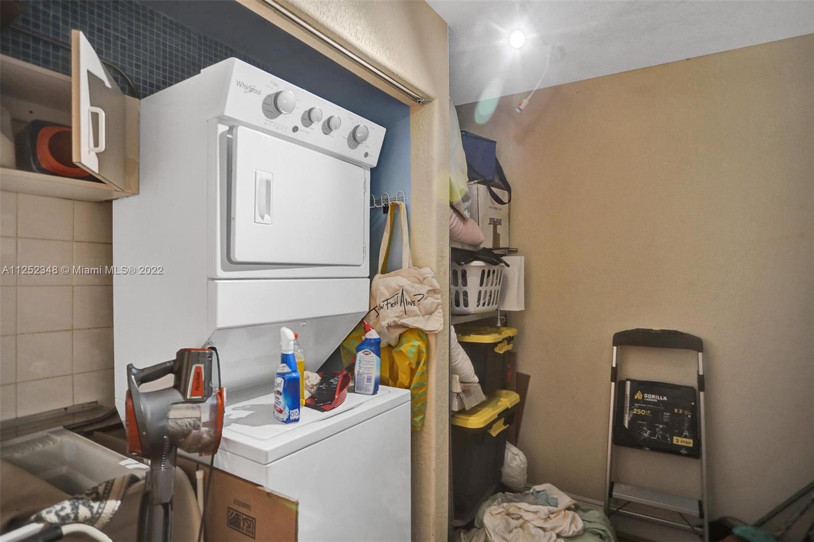 5930 Southwest 47th Street Miami, FL 33155 - Photo 38 of 43 a utility room with dryer and washer