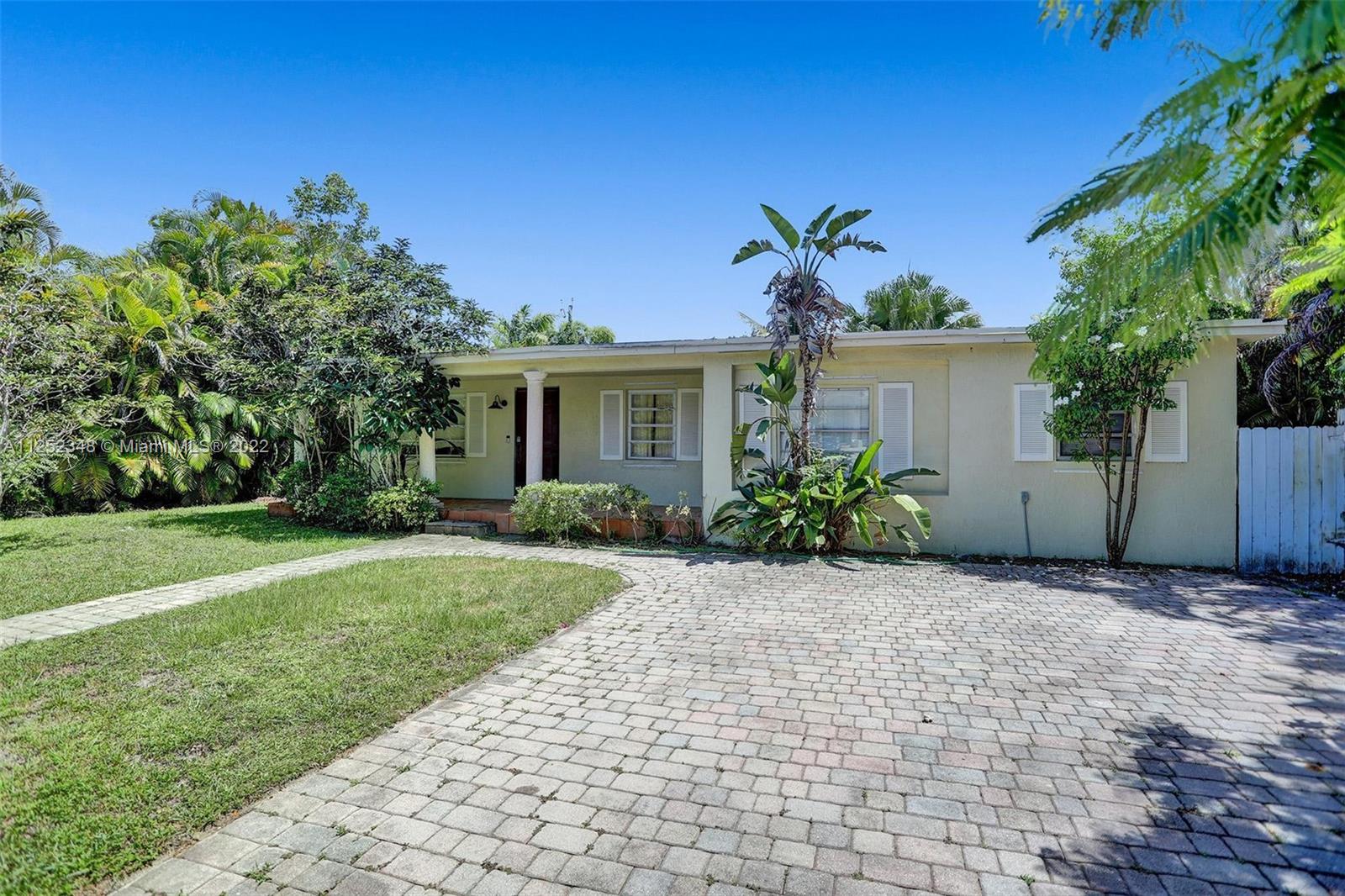 5930 Southwest 47th Street Miami, FL 33155 - Photo 4 of 43 a front view of a house with garden