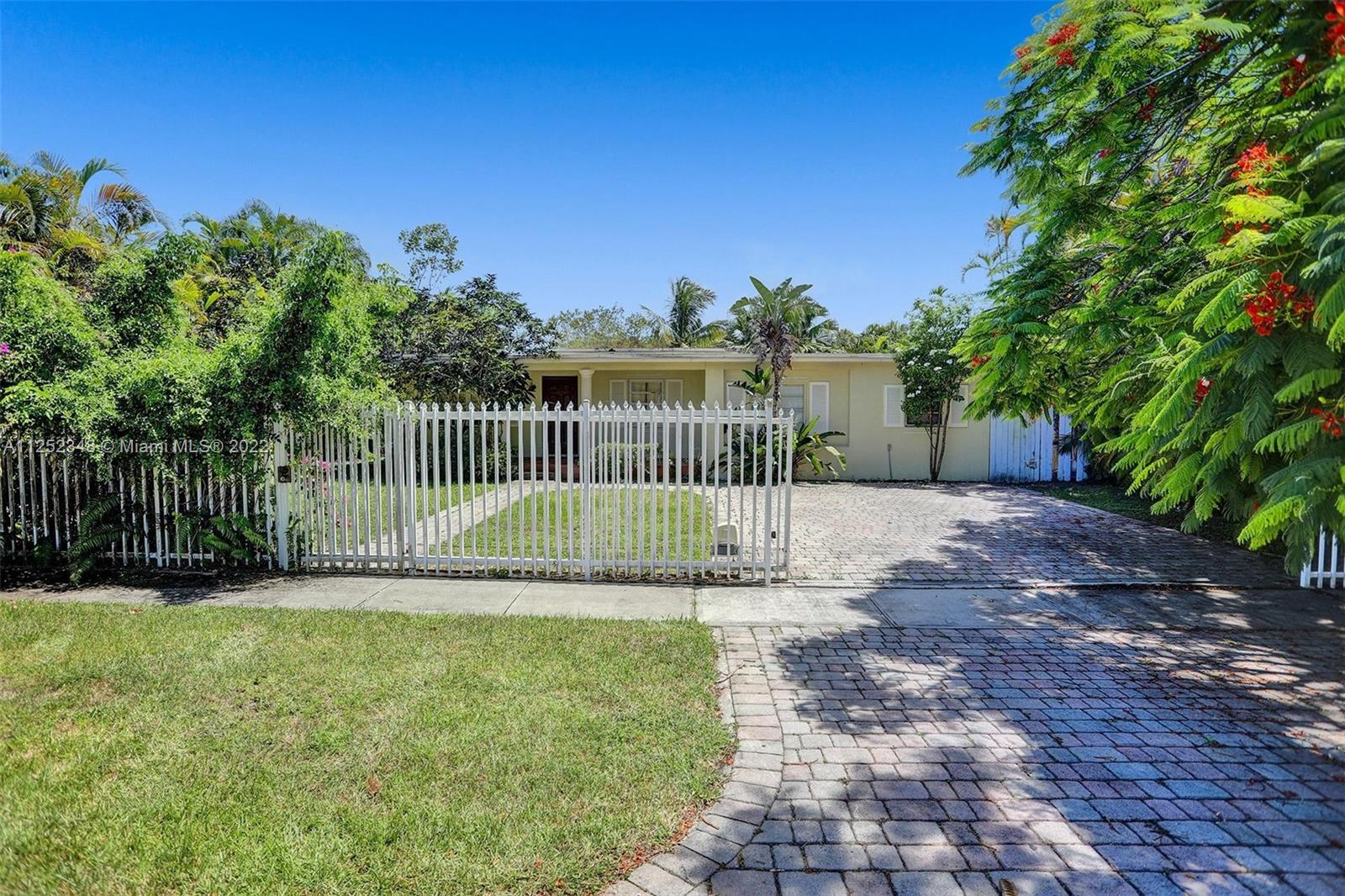 5930 Southwest 47th Street Miami, FL 33155 - Photo 6 of 43 a view of a garden with a small pool