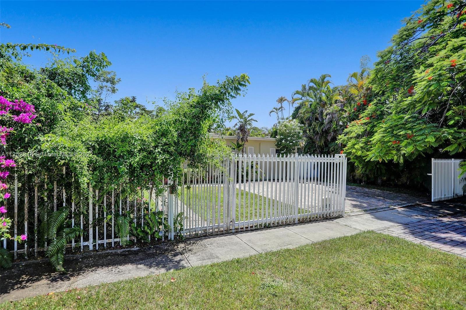 5930 Southwest 47th Street Miami, FL 33155 - Photo 7 of 43 a view of a backyard with a small garden