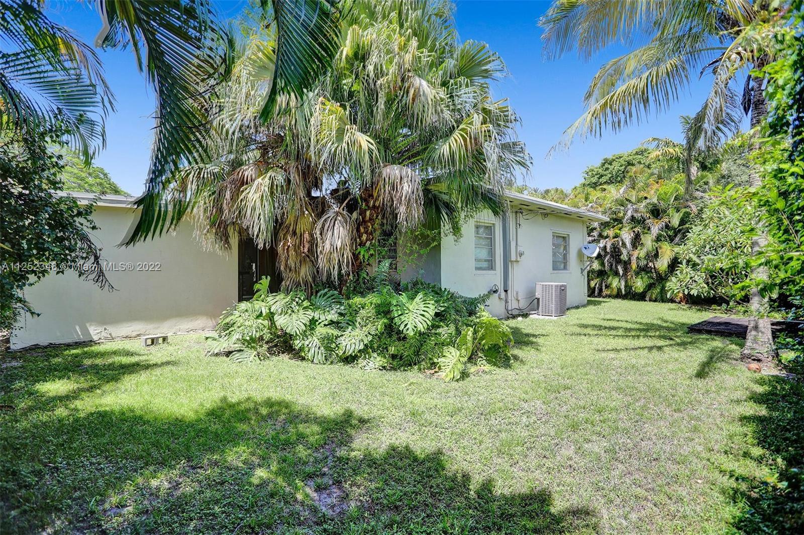 5930 Southwest 47th Street Miami, FL 33155 - Photo 9 of 43 a view of a house with a yard