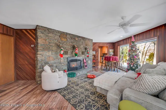 a bedroom with a bed and a mirror on dresser