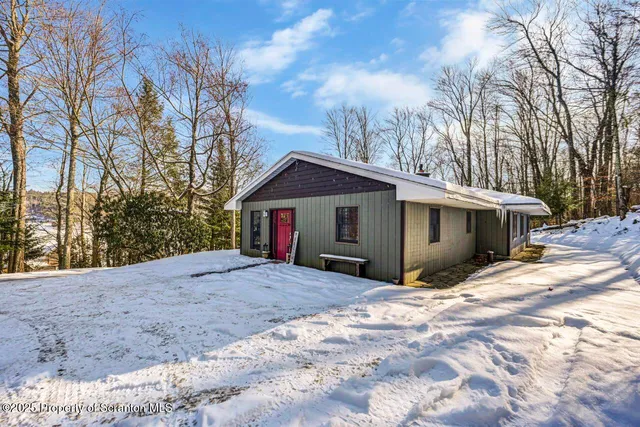 a view of a yard with a patio