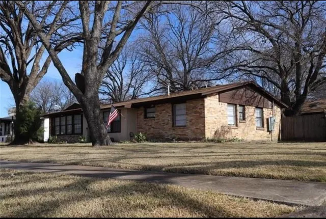 a house with trees in front of it