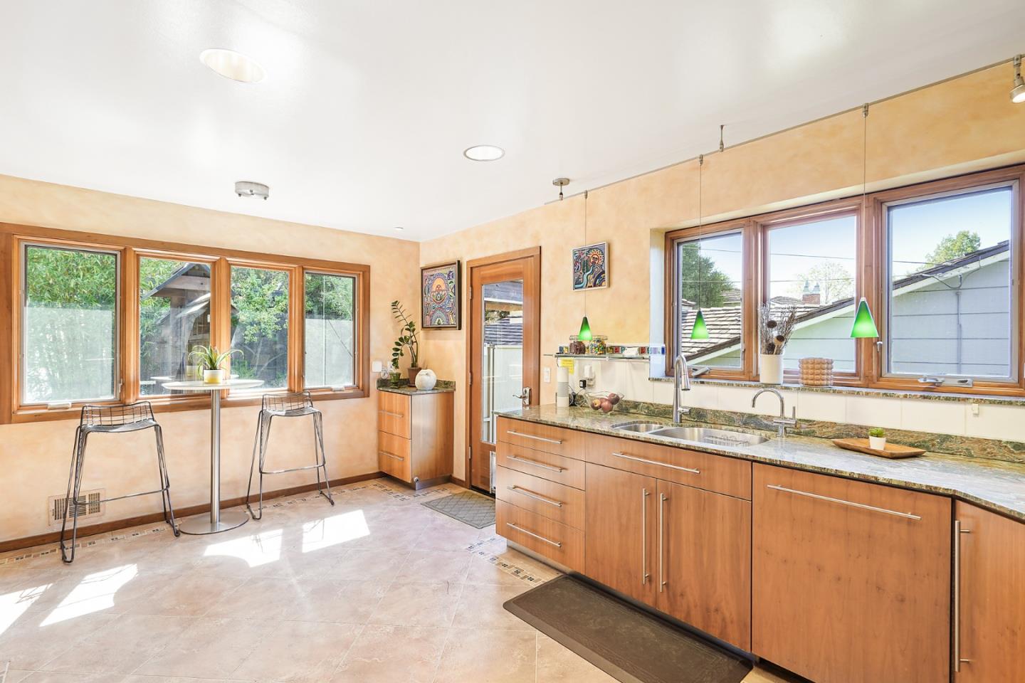 732 Knoll Drive San Carlos, CA 94070 - Photo 11 of 55 a large white kitchen with a large window