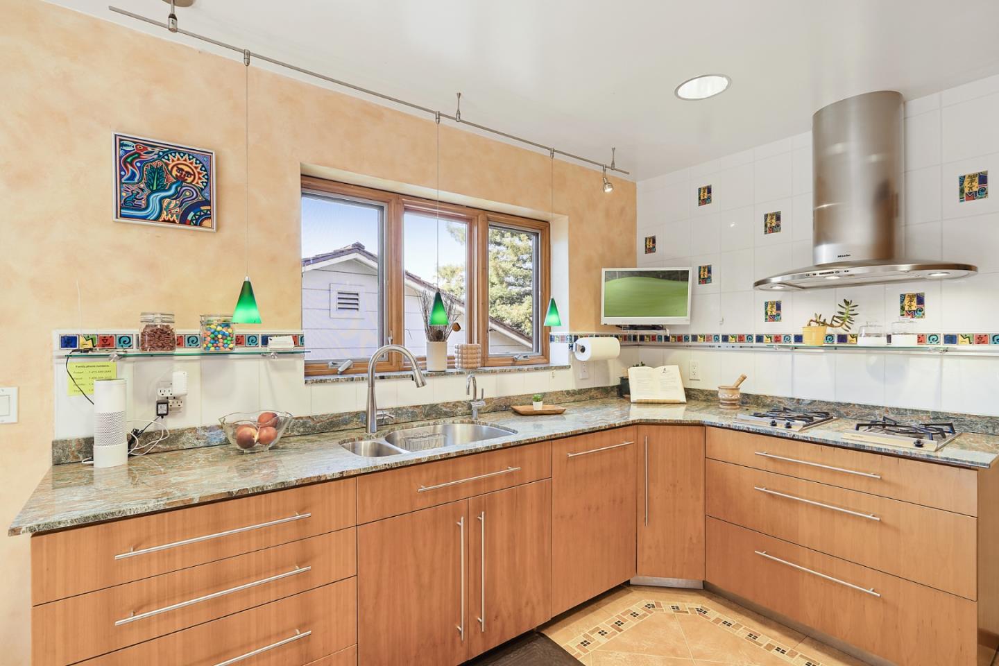 732 Knoll Drive San Carlos, CA 94070 - Photo 12 of 55 a kitchen with granite countertop a sink stainless steel appliances and cabinets