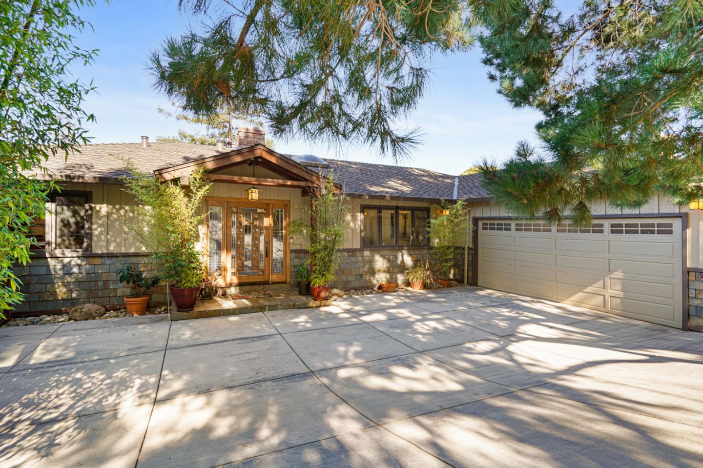 732 Knoll Drive San Carlos, CA 94070 - Photo 2 of 55 a front view of a house with a yard