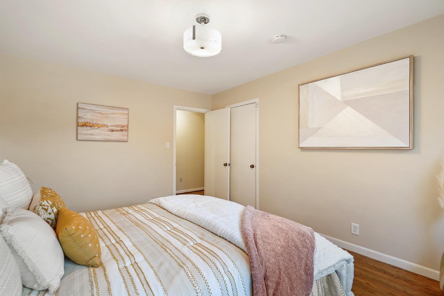 732 Knoll Drive San Carlos, CA 94070 - Photo 23 of 55 a bedroom with a bed and a painting on the wall