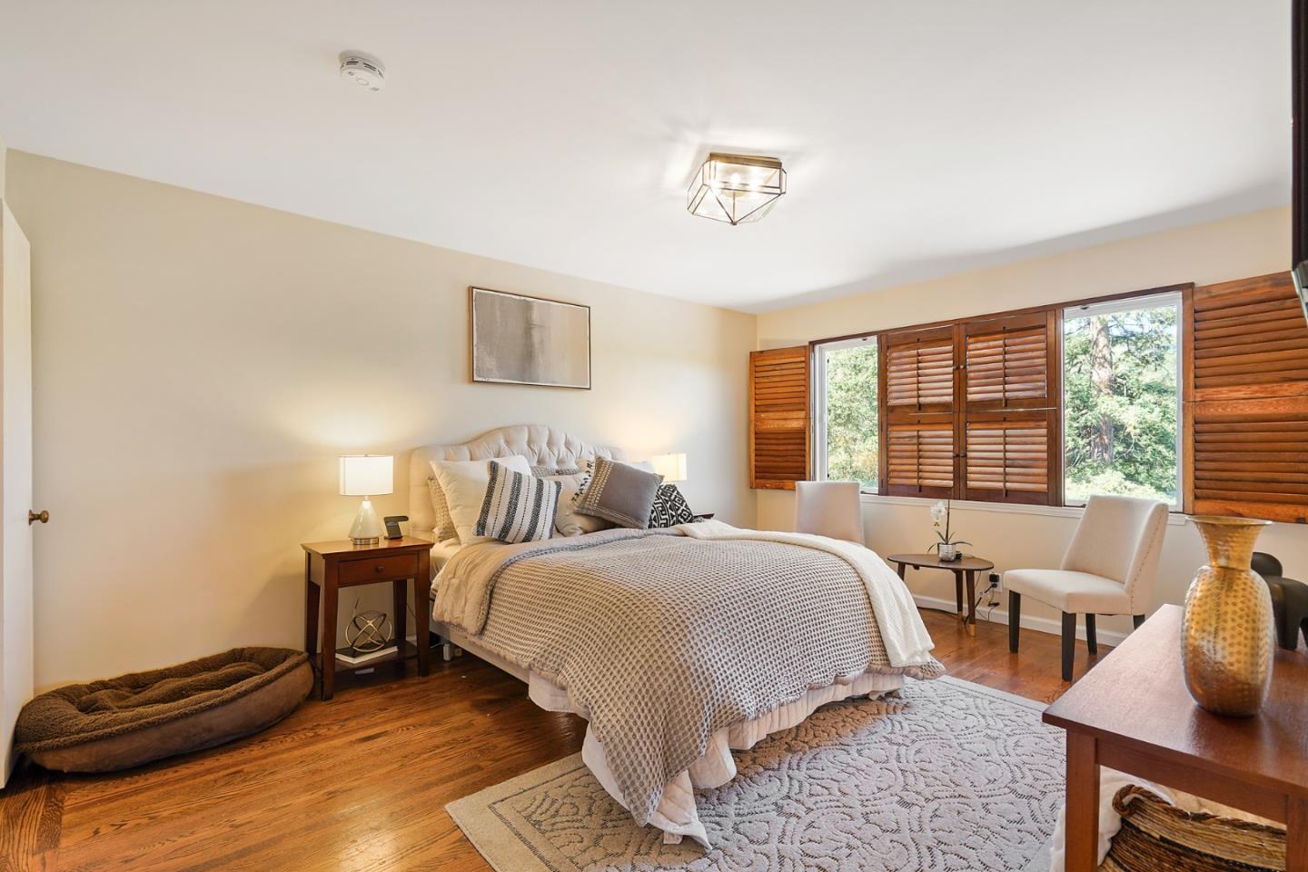 732 Knoll Drive San Carlos, CA 94070 - Photo 24 of 55 a bedroom with a bed and wooden floor