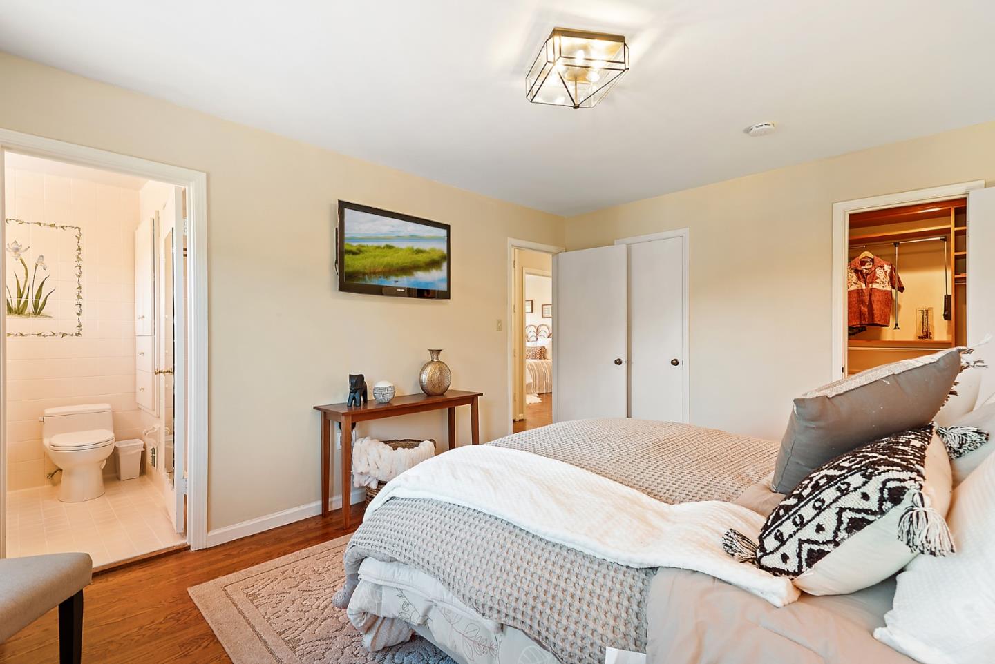 732 Knoll Drive San Carlos, CA 94070 - Photo 25 of 55 a bedroom with a bed and wooden floor