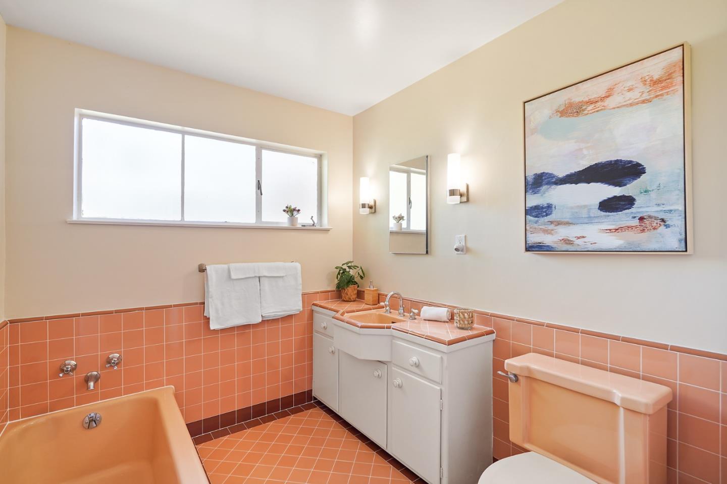 732 Knoll Drive San Carlos, CA 94070 - Photo 29 of 55 a bathroom with a sink mirror vanity and toilet