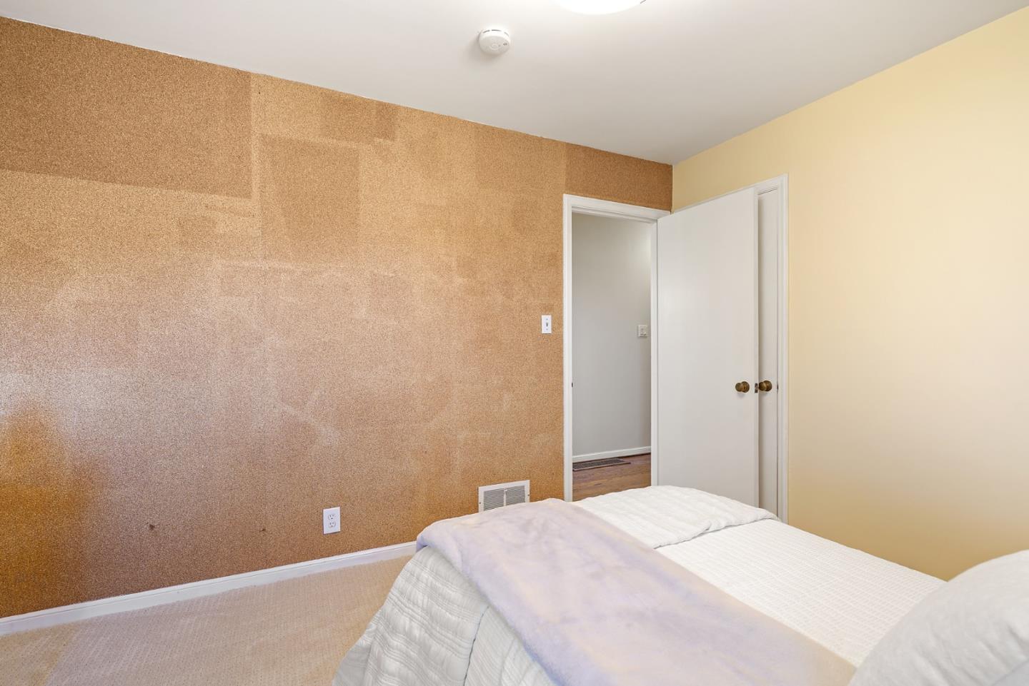 732 Knoll Drive San Carlos, CA 94070 - Photo 31 of 55 a bedroom with a bed and wooden floor