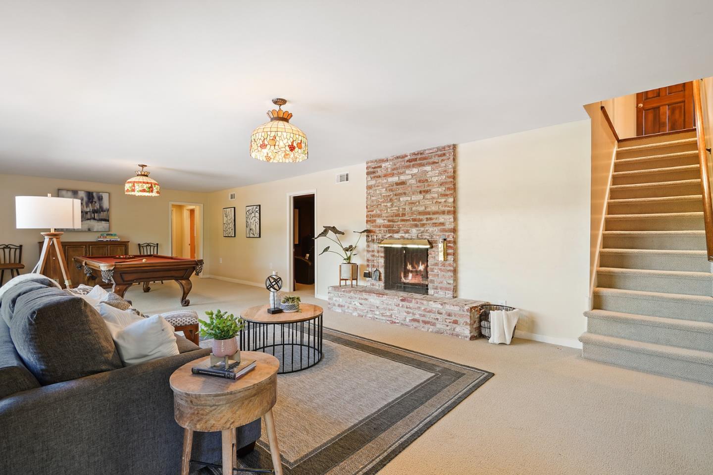 732 Knoll Drive San Carlos, CA 94070 - Photo 34 of 55 a living room with furniture and a chandelier