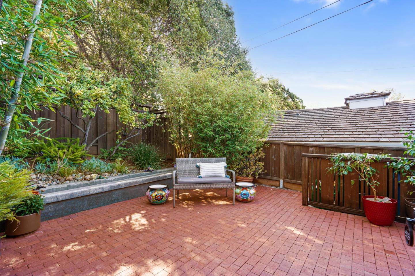 732 Knoll Drive San Carlos, CA 94070 - Photo 5 of 55 a backyard of a house with barbeque oven and outdoor seating