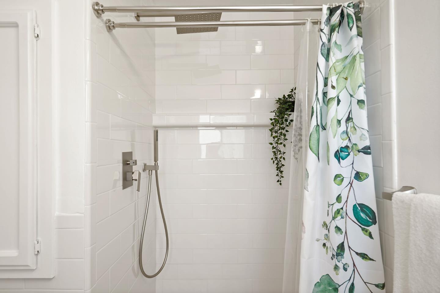732 Knoll Drive San Carlos, CA 94070 - Photo 55 of 55 a bathroom with a shower curtain a mirror and a shower curtain