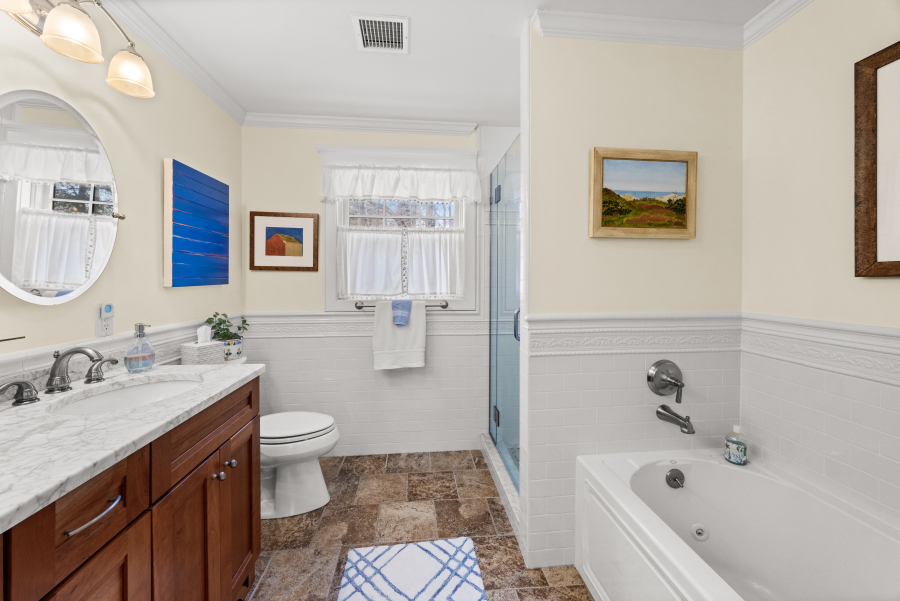 61 Causeway Road Vineyard Haven, MA 02568 - Photo 34 of 58 Full bathroom with double-sink vanity, walk-in shower, and Jacuzzi tub