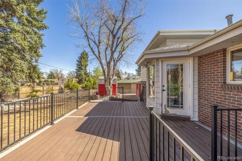a view of a house with a roof deck