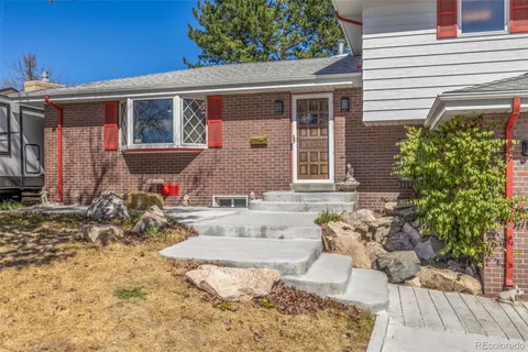 a front view of a house with patio
