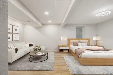 a living room with furniture and night lamp