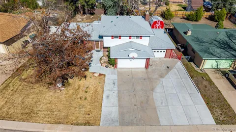 a front view of a house with yard