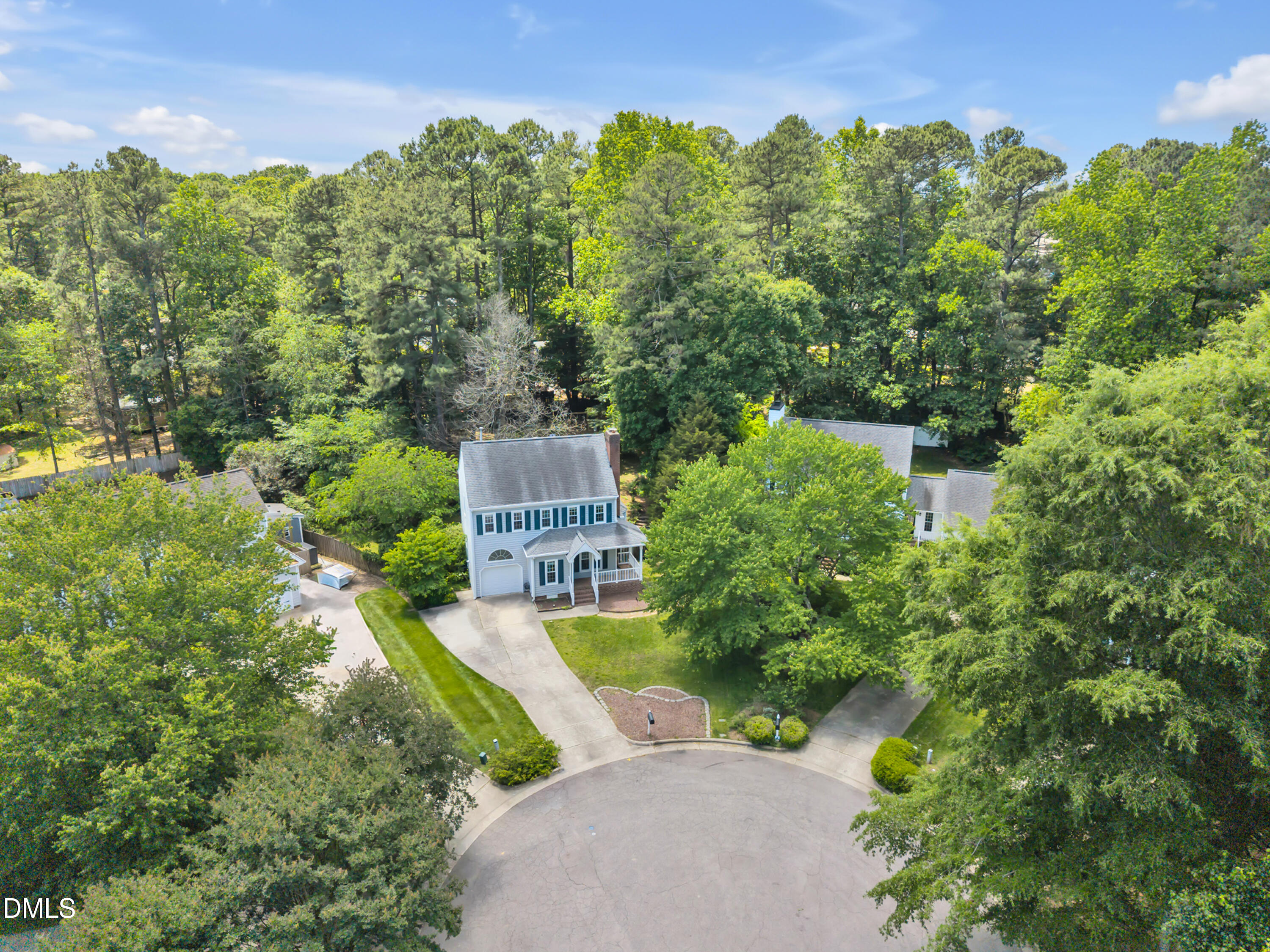 7500 Drayton Court Raleigh, NC 27615 - Photo 26 of 27 an aerial view of a house with yard and outdoor seating