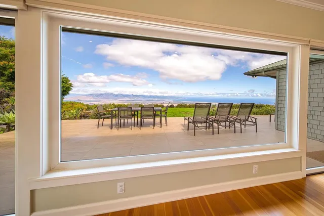 a view of swimming pool with outdoor seating