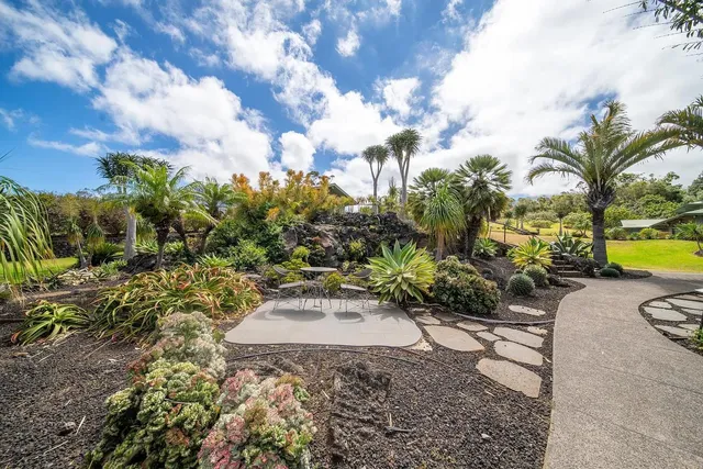 a view of a garden with a patio
