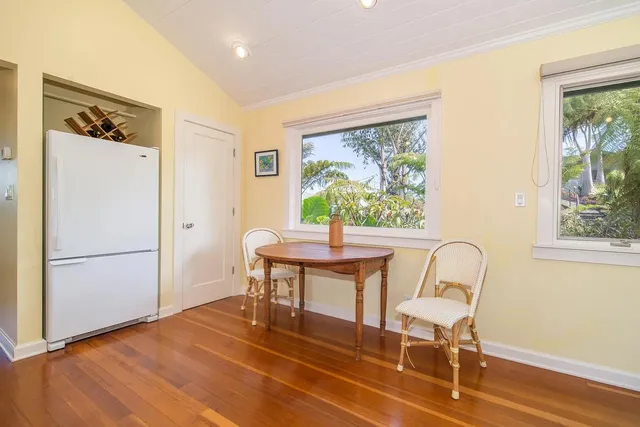 a work room with furniture and a window
