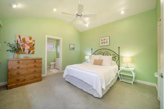 a bedroom with a bed and a cabinets