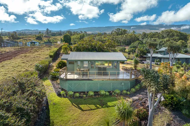 a view of a swimming pool with a garden