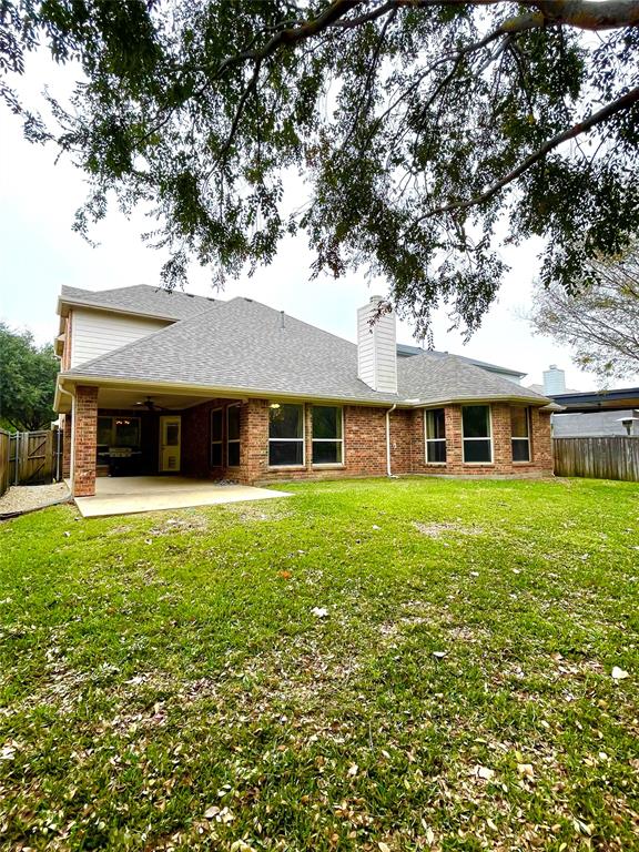 5412 Bentrose Drive McKinney, TX 75070 - Photo 22 of 24 a front view of a house with a garden