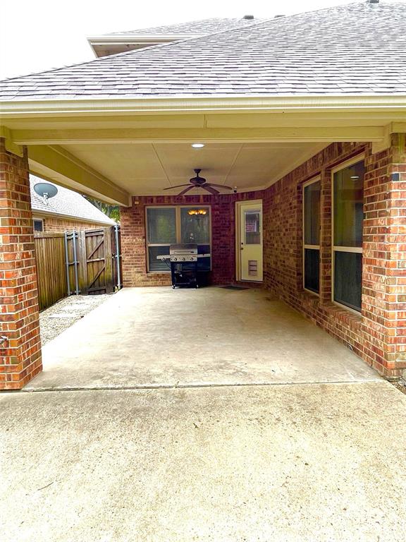 5412 Bentrose Drive McKinney, TX 75070 - Photo 23 of 24 a view of a swimming pool with a chair and a fireplace