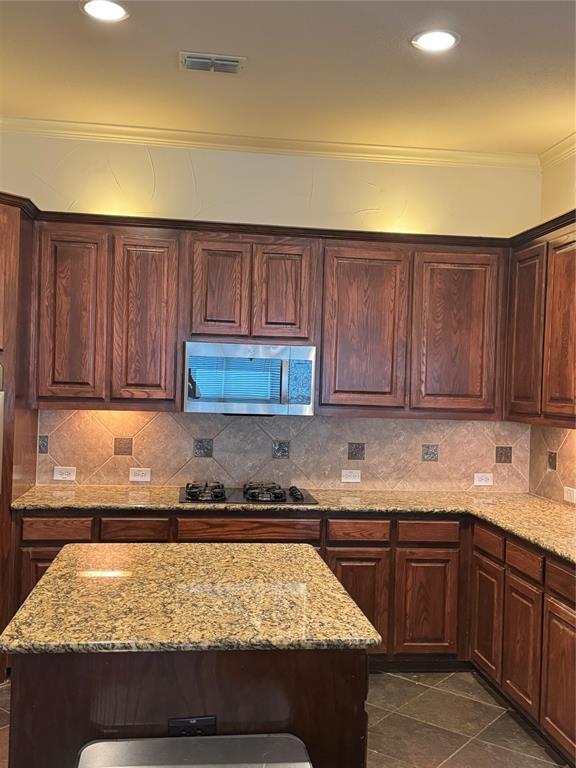 5412 Bentrose Drive McKinney, TX 75070 - Photo 4 of 24 a kitchen with wooden cabinets a sink and dishwasher