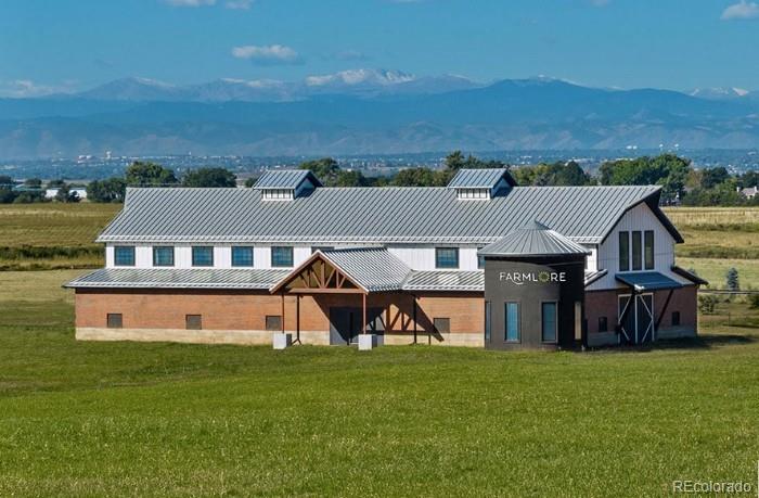 2068 Chambers Road Brighton, CO 80601 - Photo 26 of 27 an aerial view of a house with a big yard