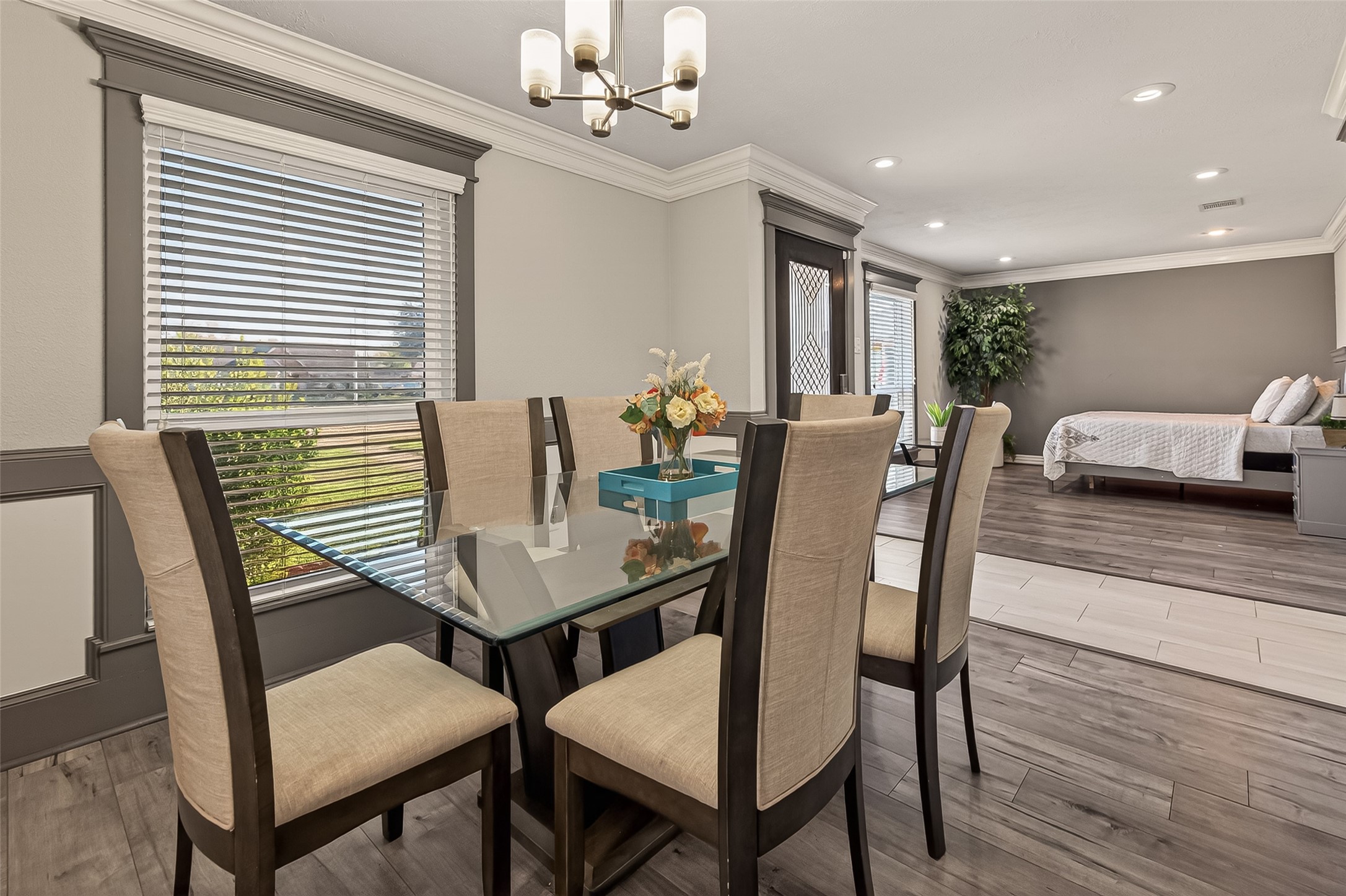15206 Ridingwood Drive Houston, TX 77489 - Photo 12 of 43 a view of a dining room with furniture and wooden floor