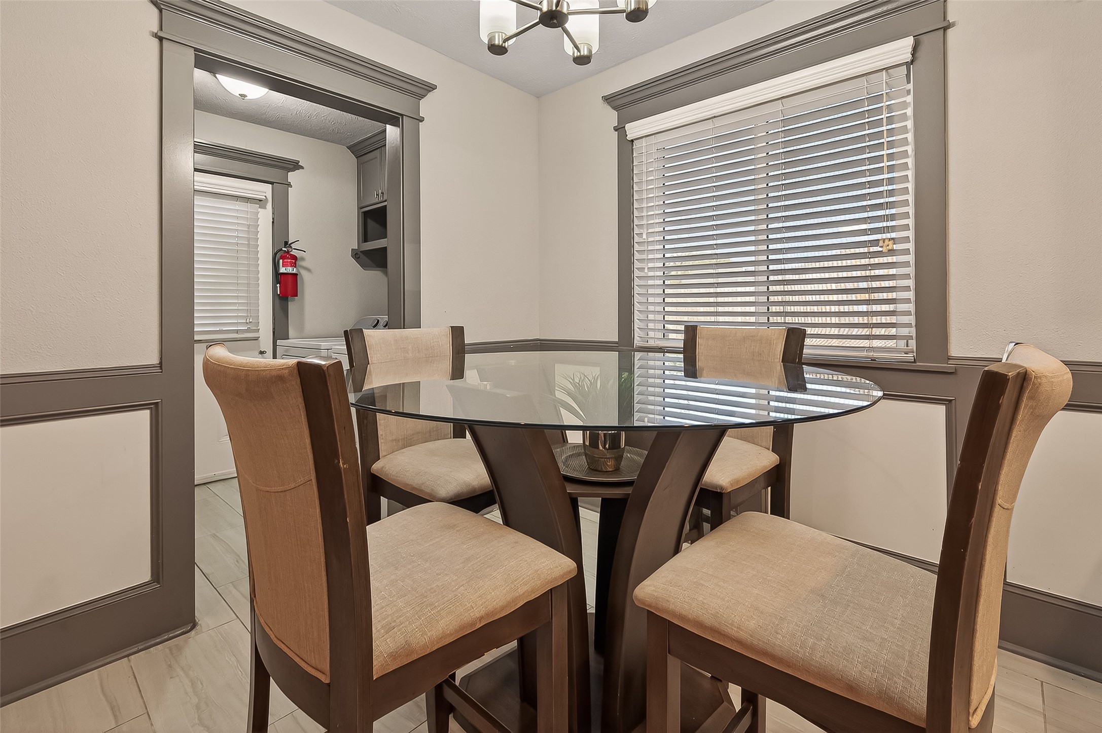 15206 Ridingwood Drive Houston, TX 77489 - Photo 17 of 43 a view of a dining room with furniture and wooden floor