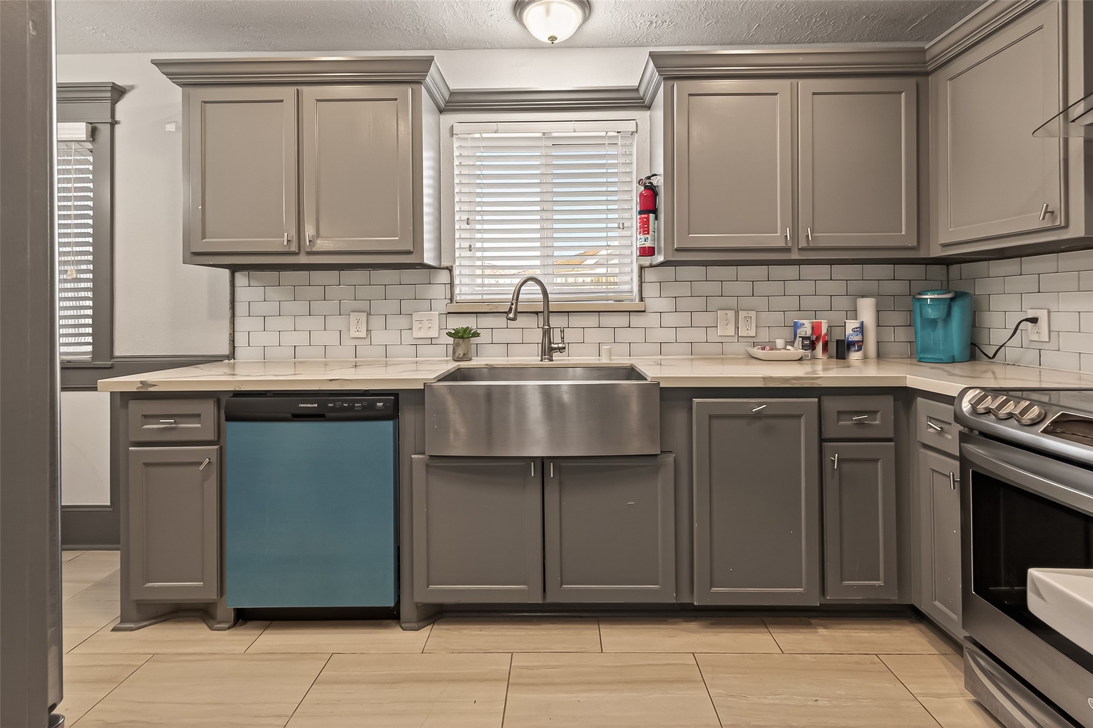 15206 Ridingwood Drive Houston, TX 77489 - Photo 22 of 43 a kitchen with stainless steel appliances granite countertop a sink stove and cabinets