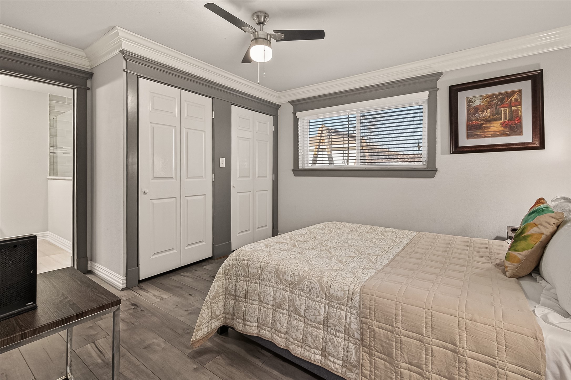 15206 Ridingwood Drive Houston, TX 77489 - Photo 36 of 43 a bedroom with a bed and wooden floor