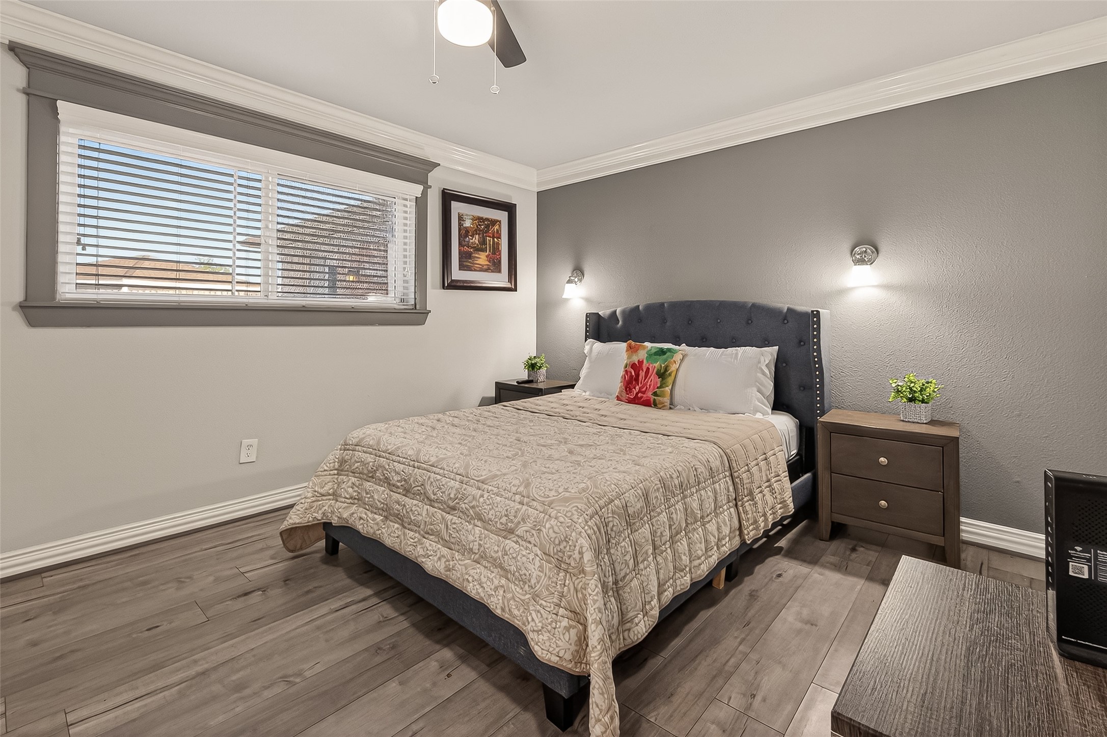 15206 Ridingwood Drive Houston, TX 77489 - Photo 37 of 43 a bedroom with a bed and a night stand