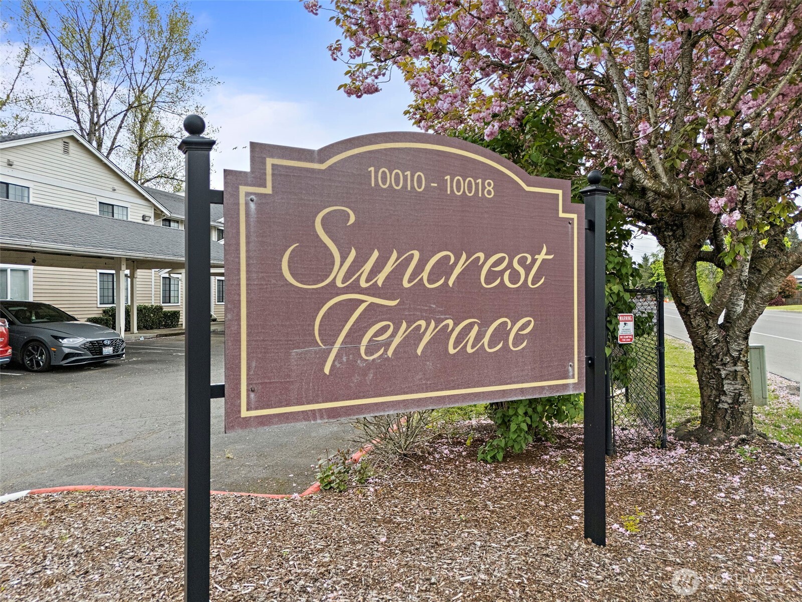 10010 Golden Given Road East, Unit 4 Tacoma, WA 98445 - Photo 19 of 19 a sign broad