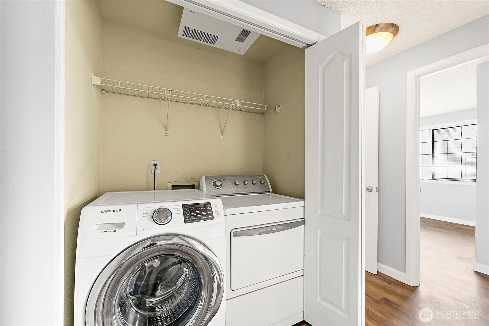 10010 Golden Given Road East, Unit 4 Tacoma, WA 98445 - Photo 9 of 19 a utility room with dryer and washer