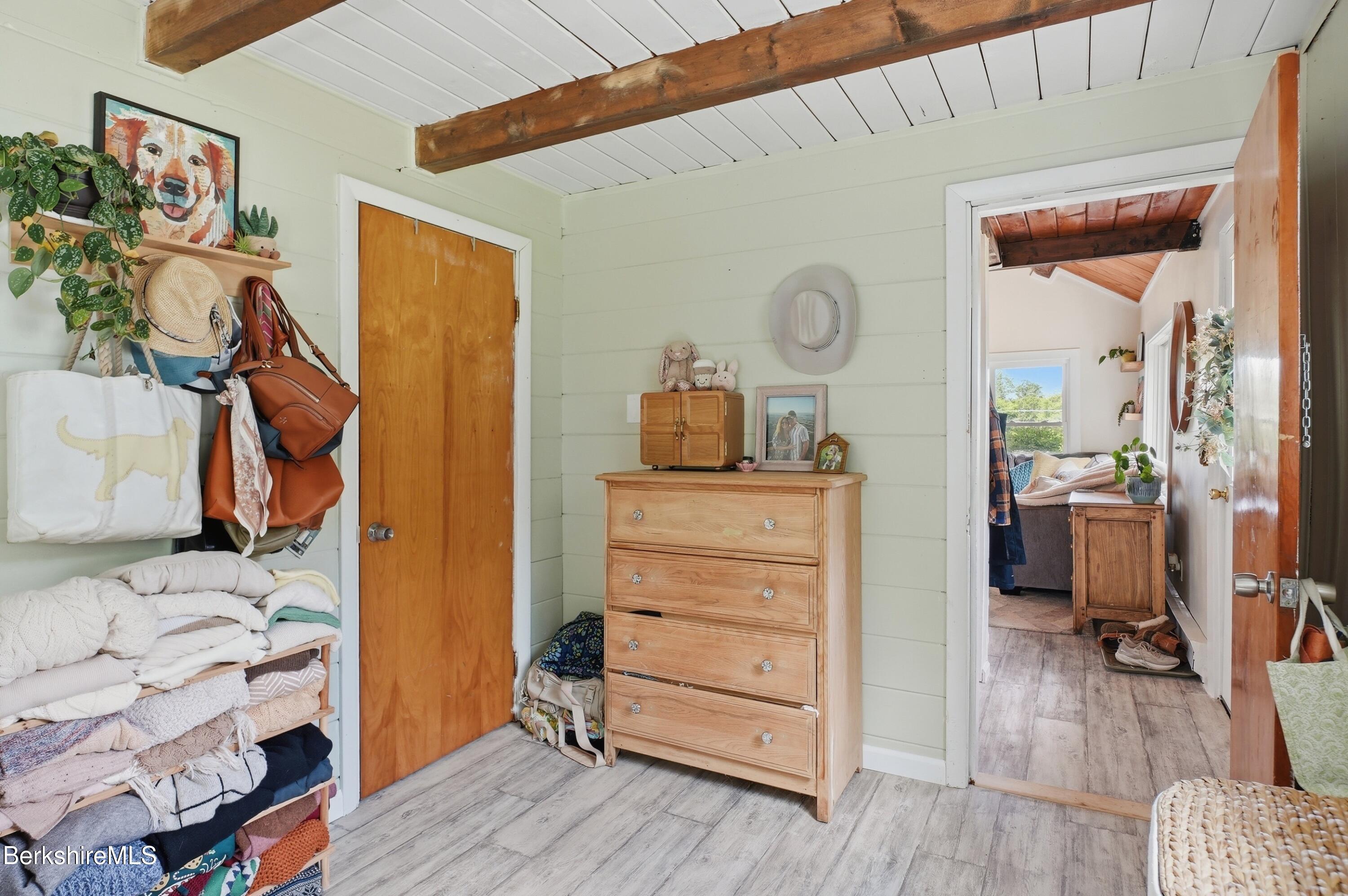 4 David Drive Peru, MA 01235 - Photo 22 of 44 a bedroom with a bed and wooden floor