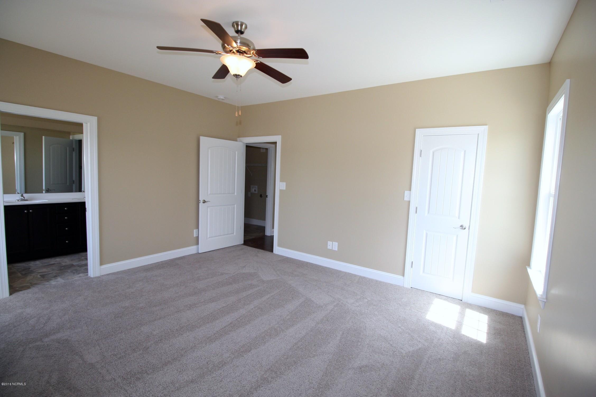 202 East Ridge Court Jacksonville, NC 28540 - Photo 32 of 41 Master Bedroom