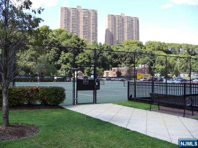 26 Ave At Port Imperial, Unit 307 West New York, NJ 07093 - Photo 25 of 25 a view of a chairs and table in the backyard