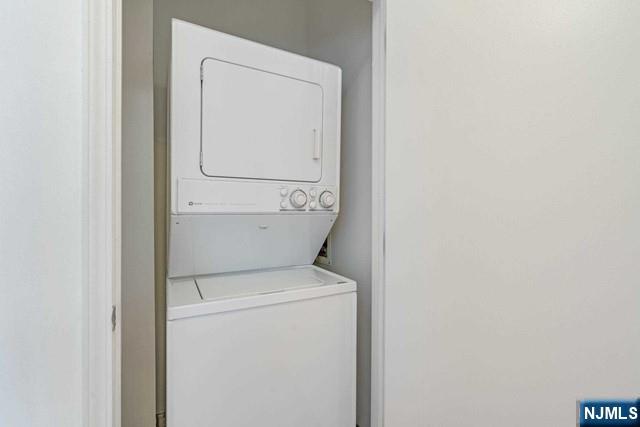 26 Ave At Port Imperial, Unit 307 West New York, NJ 07093 - Photo 9 of 25 a utility room with dryer and washer