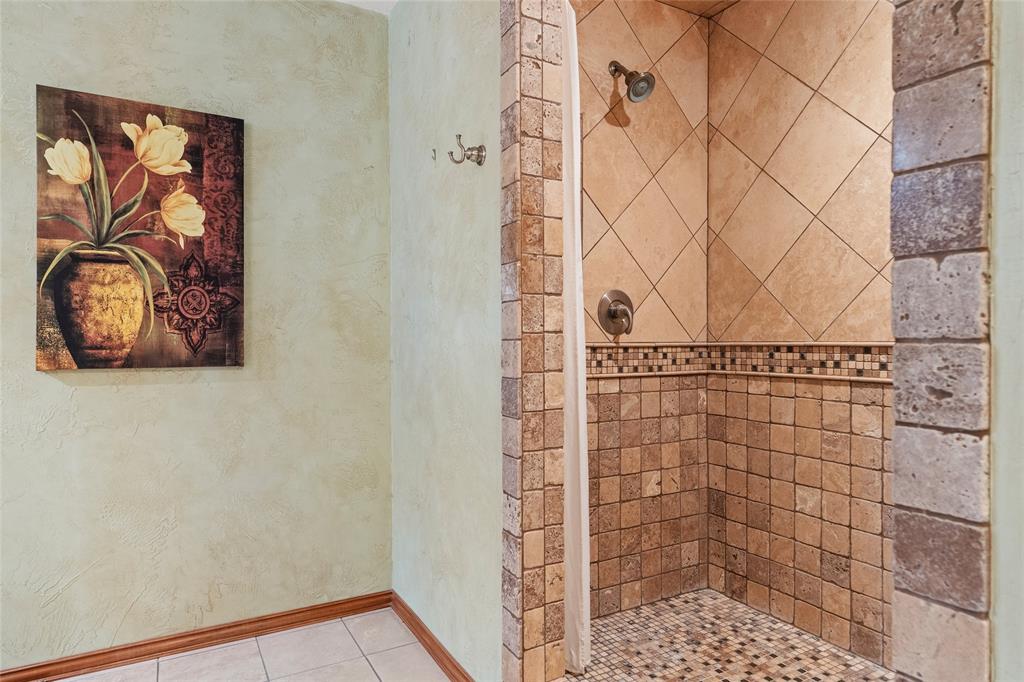 5840 Crystal Drive Midlothian, TX 76065 - Photo 24 of 36 a bathroom with a shower