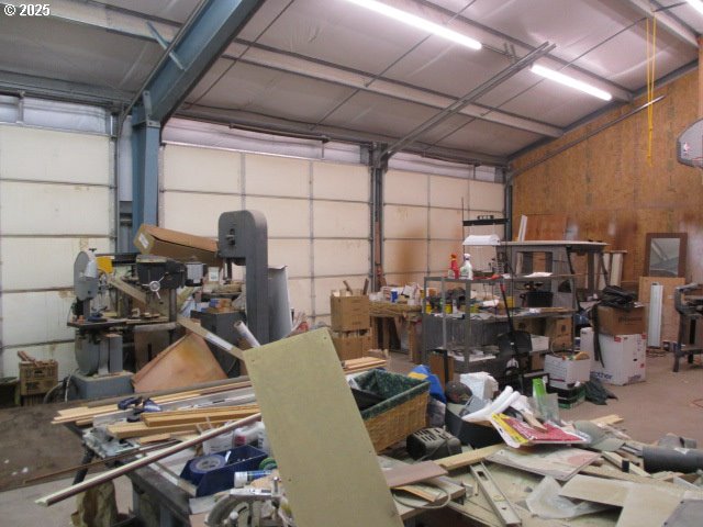 558 East Fulton Street Union, OR 97883 - Photo 38 of 41 a room with gym equipment and lots of wooden furniture