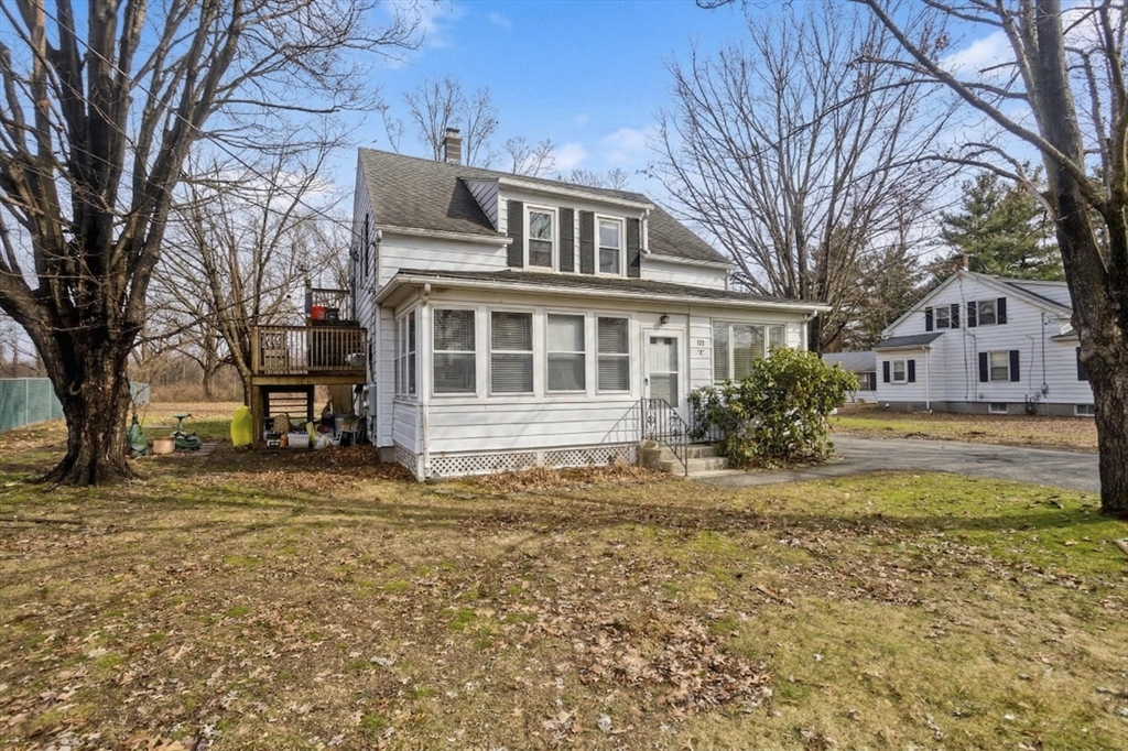 177 Marion Street Chicopee, MA 01013 - Photo 34 of 36 a big house with large tree in front of it